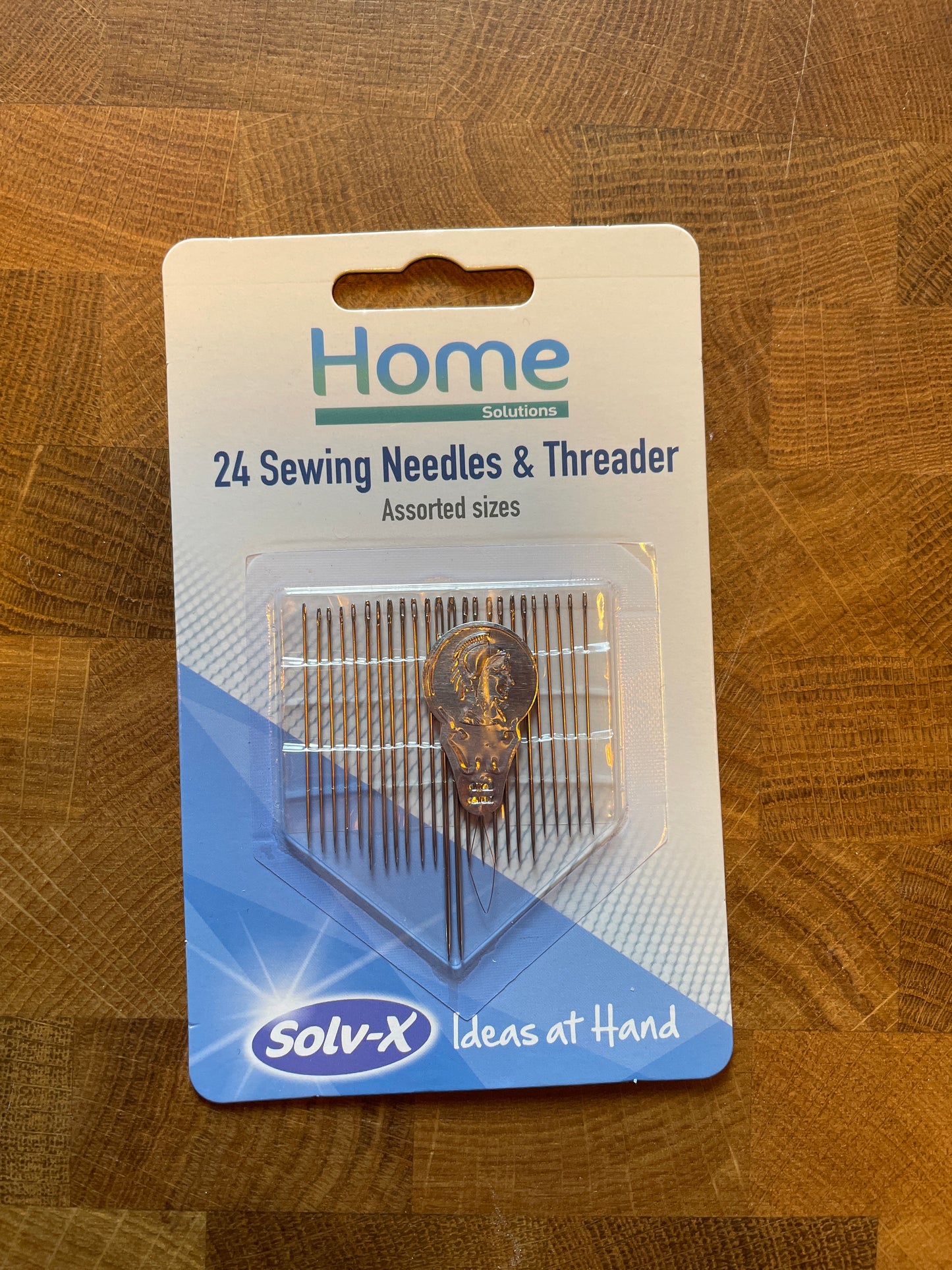Sewing needles and threader