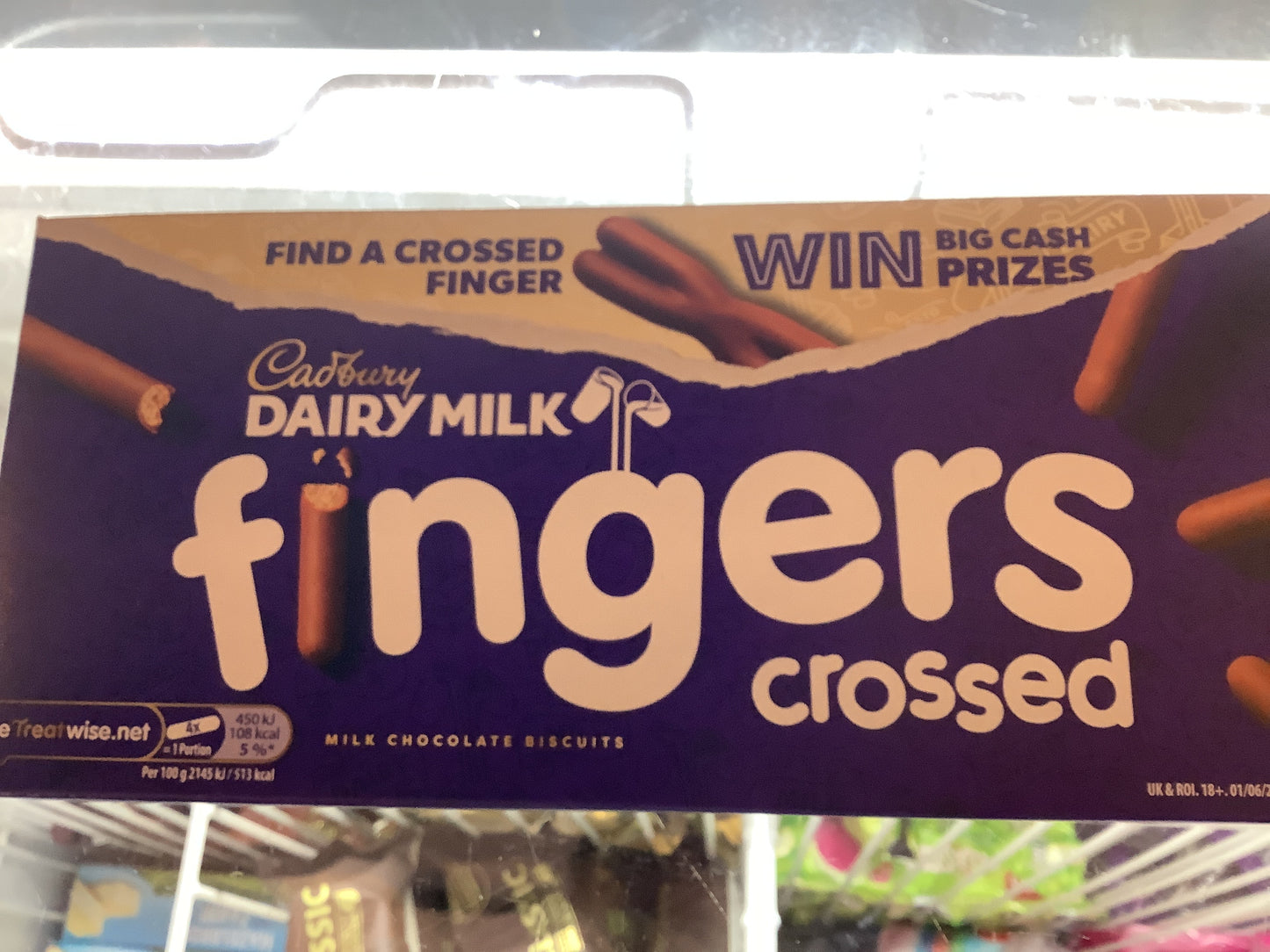 Dairy milk fingers crossed